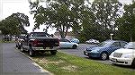A number of association members have commented on numerous occasions about OPA Board member Les Purcell parking his truck on the grass at the Yacht Club. One association member decided to take a photo