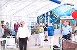 Scene at the Ocean Pines indoor pool grand opening in 2007. Barbara Kissel in foreground, left; Bob Lassahn on right.