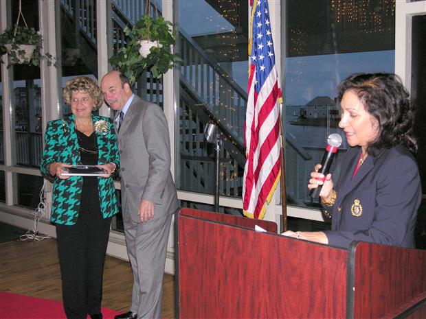 Andrea Barnes Accepts Award