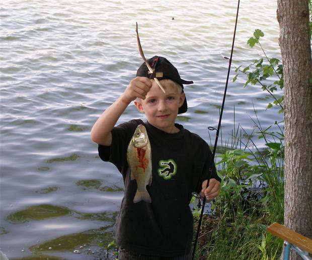 Boy Learns To Fish 