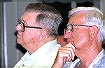 OPA 2004 Board of Directors candidate Bruce McIntire (left) and resident Bob Abele (not a candidate) listen intently at the OPA meeting of 6/16/2004.