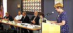 Moderator Phyllis Truitt reads a question for candidates during the 2004 OPCA OPA Candidates Forum.