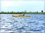 Kayaker among grassy islands in Delaware Seashore State Park 7/30/2004.