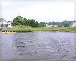 The small beach in Wood Duck Park is sometimes used by kayakers as a launch site.