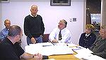 Bill Rakow, construction manager for the Veterans Memorial, goes over plans with committee members on Nov. 9, 2004.