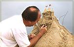 Mark Venit (a member of OPA Board of Directors) touches up a sand castle he built for Dino Scalvounos, who surprised his girlfirend by putting her engagement ring in the castle.

Writer Garey Gately