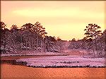 Manklin Creek at dusk on 12/26/2004 as the sun barely breaks through after a day of snow. Image taken from our front deck.