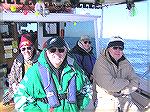 Ocean Pines Anglers Club members in Dec. shown on the Elizabeth Ann on the way out to fish for Rock off Cape Charles, Va. Cold but smiling are L to R Walt Boge; Charlie Herpen; Ward Parkin; Bill Haag.