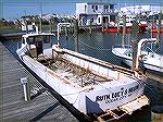 The first of two boats currently docked in front of Crab Alley in Fishermans Marina which will be sunk off Ocean City as an artificial reef. This appears to be an old clammer. Good riddance!