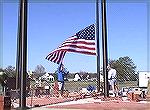 Bill Rakow runs up the United States flag for the first time over the Worcester County Veterans Memorial at Ocean Pines. 5/3/2005.