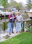 Just to prove a point here is a picture of Bob Gilbert and Larry Eberling, neighbors on Ocean Parkway just opposite Newport Drive, with some Blues caught in their canal. They said that these were some