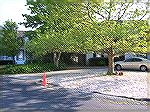 This is a view of the disputed access to Woodduck Park between Hallowells [on left] and Sharps property looking from the front on Heron drive. The garage is difficult to see as it is hidden by shrubbe