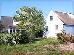 This is a view from the rear of the Halloway and Sharps property of the pedestrian easement. The Hallowell garage on the right was the one that was required by ECC to be flipped at time of constructio