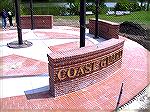 View of Veterans Memorial with Coast Guard wall in foreground. 5/111/2005.

The area inside the walls is the Circle of Honor and the paved walk around the perimeter is the Path of Glory.
On the out