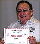 Art Sachs shows off his &quot;big fish&quot; certificate at the Ocean Pines Anglers Club meeting on 5/14/2005.