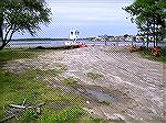 Scene at Swim & Racquet Club. Ongoing work area for removal of dredge spoils.