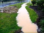 Mud/Silt flowing into Ocean Pines as a result of development work at the Pennington Commons area on the west side of Route 589 across from the South Gate of Ocean Pines. Mud and sild flows directly in