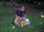 Fireman Fred Bohn cleans up after extinguishing fire at Earl & Judy Leitess home.