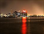 Night scene of the Domino Sugar Sign, a landmark in the Baltimore harbor.