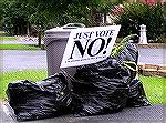 Just Vote NO! sign goes out with trash on Watertown Road.