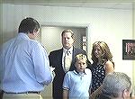 OPA Counsel Joe Moore administers oath of office to new OPA Board Member Reid Sterrett. With Sterrett are his wife Robin and son.

Photo from video stream.