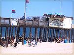 The Mexican community has found a way to use a spot ignored for years by other beach goers. They string colorful hammocks between the pilings under the OC Fishing Pier.Labor Day weekend 2005.