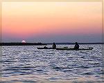 Sunset seen while kayaking at Assateague Island on 9/10/2005. (Photo for use in a kayaking trip report and Message Board messages 234943 and 234572.)

