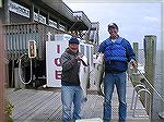 Top two finishers of the Ocean Pines Anglers Club first annual Rockfish Rumble John Jewer [L] and Budd heim display winning Rock. Both fish measured out at 31&quot; but Johns weighed in at 12.2lbs. an