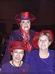 I took this portrait of my friend, Eva Scott, (lower left) and her two Red Hat friends at a charity luncheon in Ocean City, on 12-8-04.

 -- Judy Duckworth -- camera-Concord 3340z
No Photoshop, cro