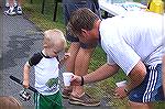 Young Angler checks out bait at the Ocean Pines Anglers Club annual Teach A Kid To Fish Day.