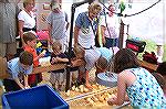 Andrea Barnes checks out the chicks where the children are allowed to get up close and personal at this years DelMarVa Chicken Festival in Snow Hill