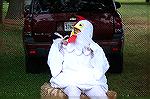 Youth takes a well deserved break from being the offical mascot at the DelMarVa Chicken Festival in Snow Hill