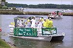 Ocean Pines Tennis Club shows off a big set of balls with their entry in the OP Boat Clubs annual Boat Parade