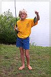 Doria McClosky of Ocean Pines shows off bluegill caught in the 10th annual Ocean Pines Anglers Club Art Hansen Memorial Kids Fishing Contest held at the South Pond.