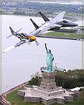 P-51 and F-15 flying past Statue of Liberty at 2006 Memorial Day Air Show at Jones Beach, NYC