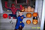 Michael and Carson Barnes get in the Halloween spirit by dressing as their favorite super heroes.   