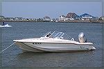 The Barnes' Scout anchored off of Assateague Island. 