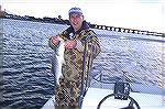 Joe Reynolds catches a nice Rockfish while flyfishing in the Coastal Bays of Ocean City.