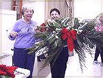 Pat Gates and Carol Weber create a beautiful swag with greens and magnolia leaves during the &quot;Decorating the Pines for the Holidays&quot; event on November 28th at the Community Hall. 