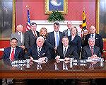 Governor O'malley at the bill signing ceremony for HB964 on April 24, 2007, banning the use of hydraulic dredges for clams in the coastal bays. Immediately behind the governor and to the right is Erin