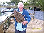Ron Howe shows off the 20&quot; Flounder that earned him second place in the Ocean Pines Anglers Club 2007 Flounder Frenzy.