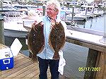 Don Messina is shown with 20 1/2&quot; and 19 1/2&quot; flounders that earned him both first place and a tie for third place in the Ocean Pines Anglers Club 2007 Flounder Frenzy.