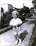 Photo of Jack Barnes in 1944 when living in Long Beach, Calif where his Dad was stationed in the Navy. His Mom labled the picture as "all dressed up in his Lord Faunteroy suit. 