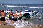 Beachgoers  near 16th st found themselves providing an unexpected hand to 
race driver Bob Muller who, to prevent sinking, had to beach his 1600HP 
racer &quot;WICKED&quot; when the front sponsoon c