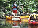 A log jam on the Tuckahoe River required paddlers and kayaks to go over the top. Sally was first. 6/26/2007
(For a kayaking trip report, Msg# 467377.)