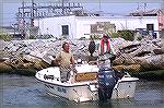 Ocean Pines Angler Budd Heim holds up what proved to be the winning flounder at 22 1/4 inches caught during the MSSA flounder tournament in July. Fishing partner Harry Doan looks on in disbelief. The 