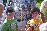 Ben & Sam Kittrell of Belgium, visiting grandparents and Ocean Pines residents Jim & Barbara Duke line up for registration at the Ocean Pines Anglers Club Kids Fishing Tournament.