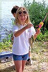 Marissa Grosso holds up her catch that proves she will not be taking a back seat to any boys in the Ocean Pines Anglers Kids Fishing Tournament at the South Pond. 