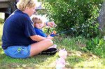 2 year old Hannah Tilton and her mom Susan show Hannahs doll the fine art of fishing at the Ocean Pines Anglers Club, Kids Fishing Tournament at the South Pond. 