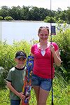 Dylan, age 7 and older sister Kali display there prizes won at the Ocean Pines Anglers Club Kids Fishing Tournament. 